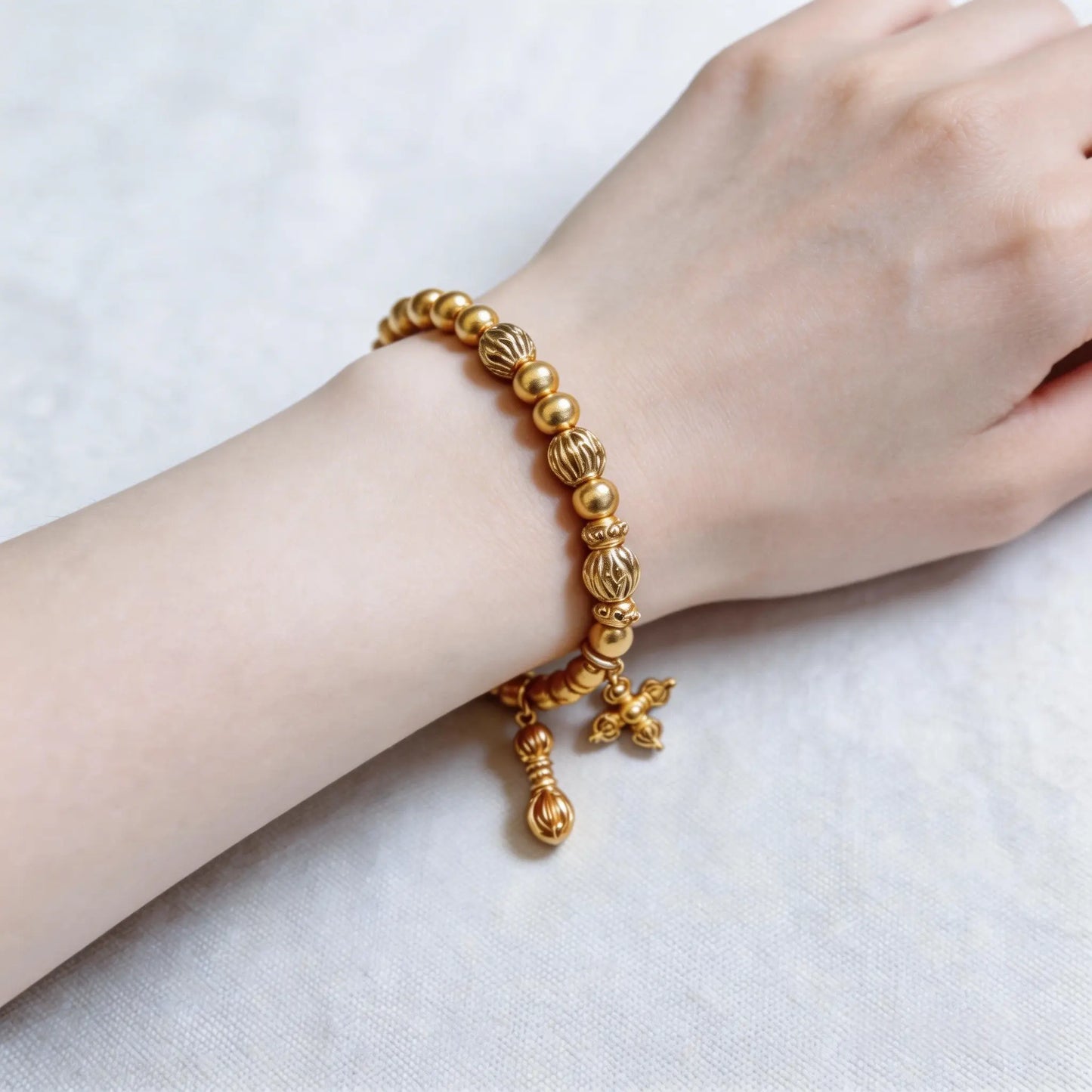 Traditional Gold-Dust Vajra Bracelet - Fortune and Prosperity, Round Beads with Four-Leaf Flower Bracelet