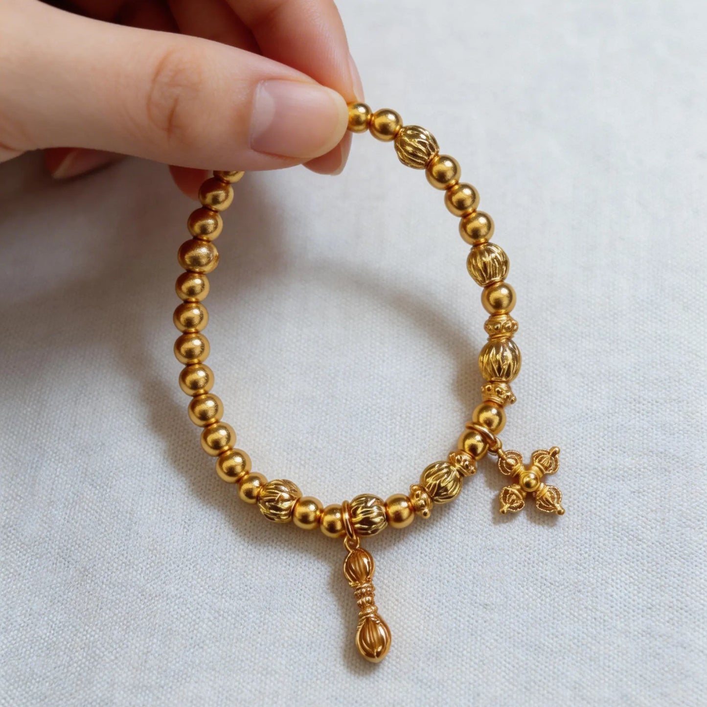 Traditional Gold-Dust Vajra Bracelet - Fortune and Prosperity, Round Beads with Four-Leaf Flower Bracelet
